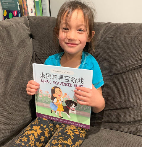 A family reading a Lychee Press book