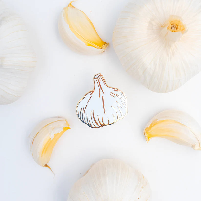 Garlic enamel pin designed by Sherry's Palette