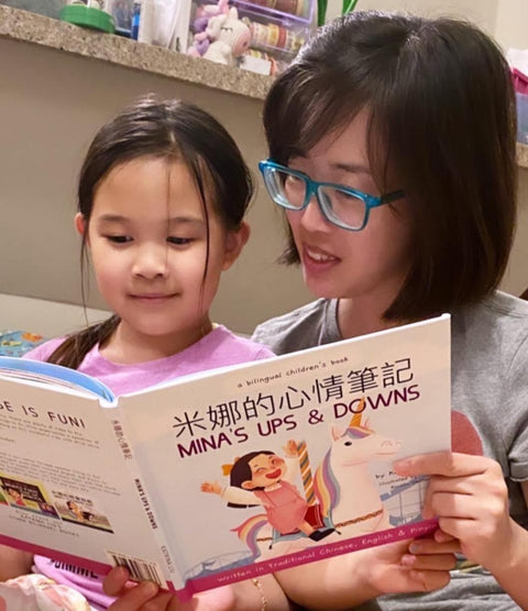 A family reading a Lychee Press book