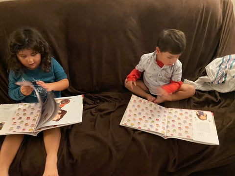 A family reading a Lychee Press book