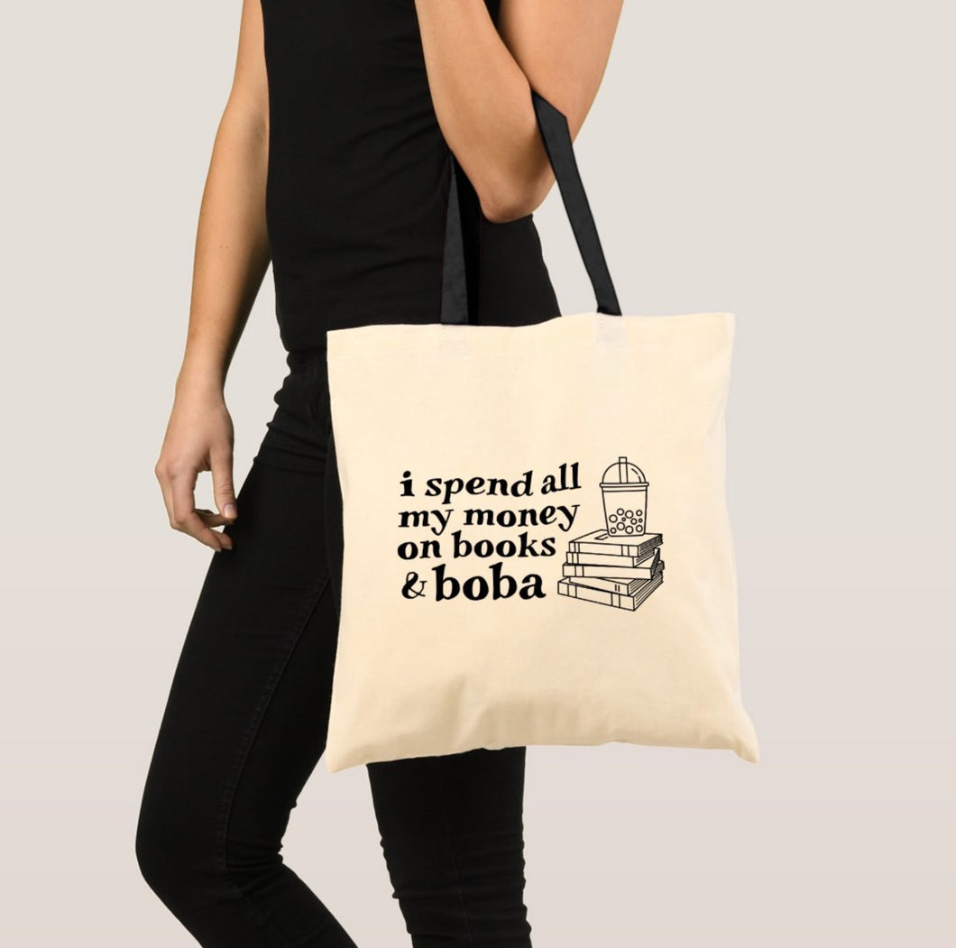 I spend all my money on books and boba cotton tote bag