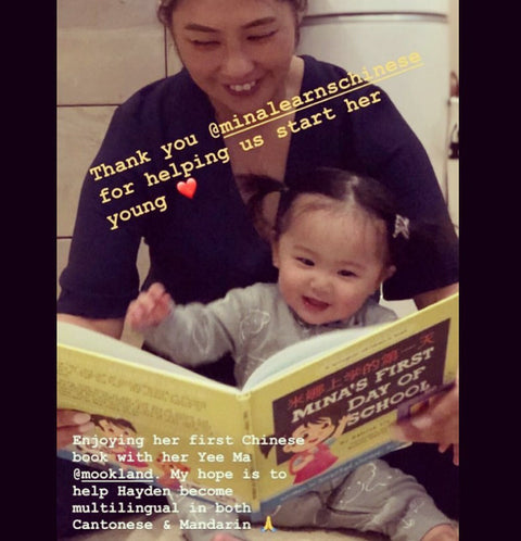 A family reading a Lychee Press book