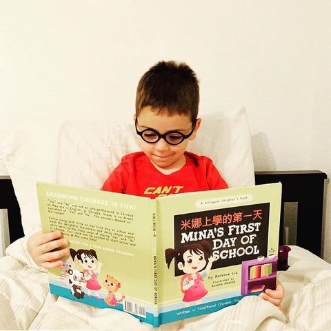 A family reading a Lychee Press book