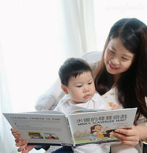A family reading a Lychee Press book