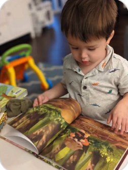 A family reading a Lychee Press book
