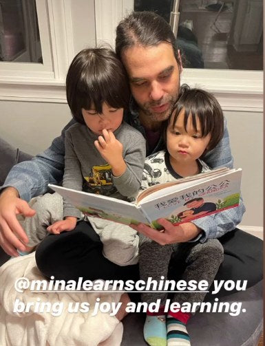 A family reading a Lychee Press book