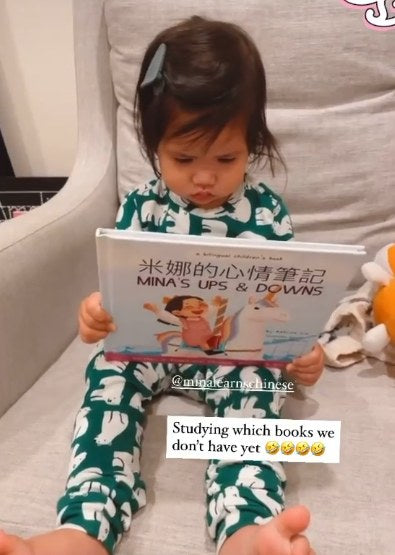A family reading a Lychee Press book